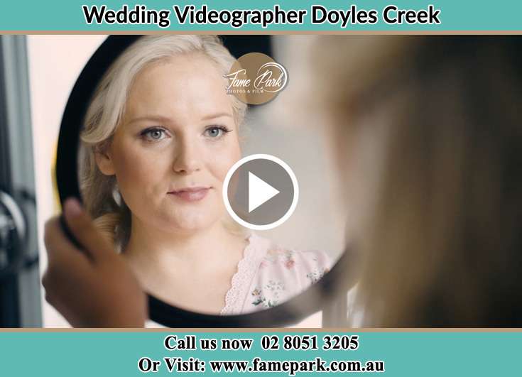 The Bride looking at the mirror Doyles Creek NSW 2330